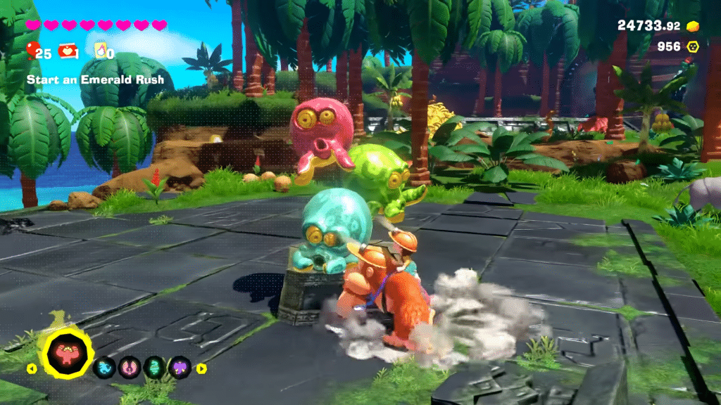 Donkey Kong Bananza si espande: vale la pena il DLC Isola DK + Caccia agli Smeraldi? Donkey Kong e Pauline davanti a una statua colorata nell’Isola DK del DLC Bananza.